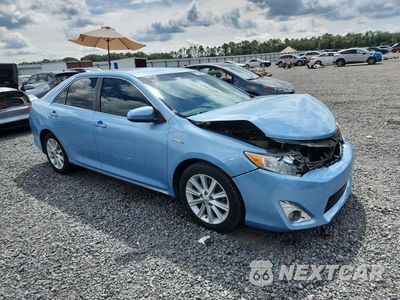 Czwarte zdjęcie samochodu z boku: 2012 TOYOTA CAMRY HYBRID XLE VIN:4T1BD1FK3CU043722 - miniatura