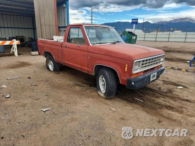 Czwarte zdjęcie samochodu z boku: 1984 FORD RANGER VIN:1FTCR11A3EUD69810 - miniatura