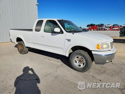 Czwarte zdjęcie samochodu z boku: 2002 FORD F150 VIN:1FTRX18W52NB34039 - miniatura