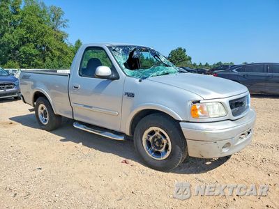Czwarte zdjęcie samochodu z boku: 2003 FORD F150 VIN:2FTRF17273CB04940 - miniatura