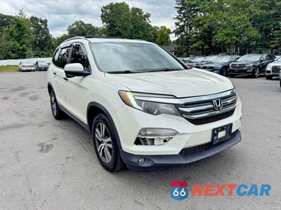 Czwarte zdjęcie samochodu z boku: 2018 HONDA PILOT EXL VIN:5FNYF6H52JB041110 - miniatura