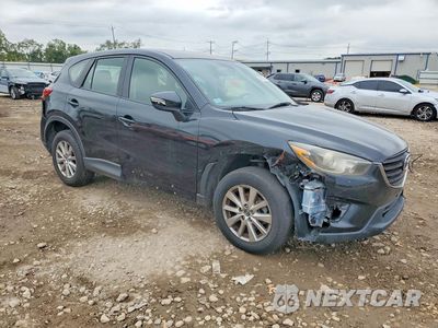 Czwarte zdjęcie samochodu z boku: 2016 MAZDA CX-5 SPORT VIN:JM3KE2BYXG0627945 - miniatura