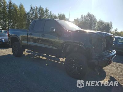 Czwarte zdjęcie samochodu z boku: 2019 GMC SIERRA K1500 AT4 VIN:1GTR9EED4KZ298699 - miniatura