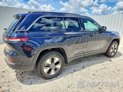 Trzecie zdjęcie samochodu z tyłu: 2024 JEEP GRAND CHEROKEE LIMITED 4XE VIN:1C4RJYB64RC142688 - miniatura