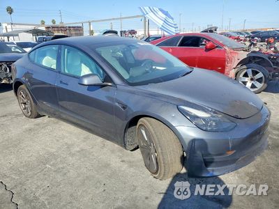 Czwarte zdjęcie samochodu z boku: 2023 TESLA MODEL 3 VIN:5YJ3E1EA1PF615240 - miniatura