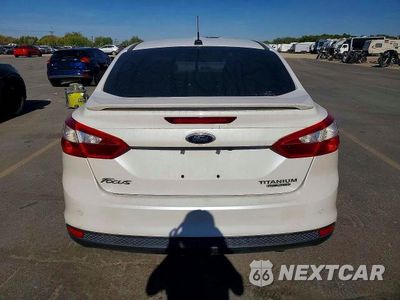 Zdjęcie 6 z 13 samochodu: 2013 FORD FOCUS TITANIUM VIN:1FADP3J26DL210546 - miniatura