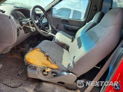 Zdjęcie 7 z 13 samochodu: 2000 FORD F150 VIN:1FTZF0720YKA85550 - miniatura