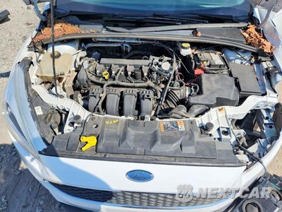 Zdjęcie 11 z 13 samochodu: 2018 FORD FOCUS SE VIN:1FADP3F25JL212731 - miniatura