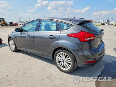 Drugie zdjęcie samochodu z przodu: 2017 FORD FOCUS TITANIUM VIN:1FADP3N26HL349219 - miniatura