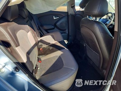 Zdjęcie 10 z 12 samochodu: 2011 HYUNDAI TUCSON GLS VIN:KM8JUCAC0BU158381 - miniatura