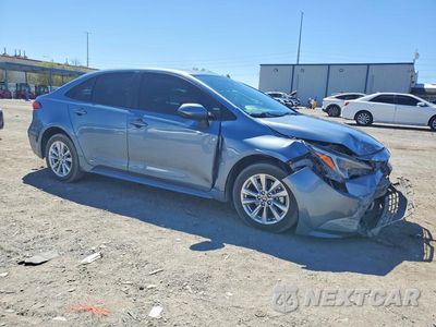 Czwarte zdjęcie samochodu z boku: 2024 TOYOTA COROLLA HYBRID LE VIN:JTDBDMHE2RJ008922 - miniatura
