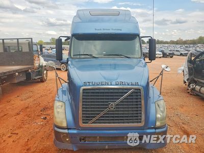 Piąte zdjęcie samochodu w środku: 2012 VOLVO VNL SEMI TRUCK VIN:4V4NC9EG4CN536940 - miniatura