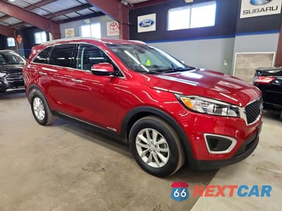 Czwarte zdjęcie samochodu z boku: 2017 KIA SORENTO LX V6 VIN:5XYPGDA54HG191990 - miniatura