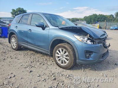 Czwarte zdjęcie samochodu z boku: 2016 MAZDA CX-5 TOURING VIN:JM3KE4CY3G0603562 - miniatura