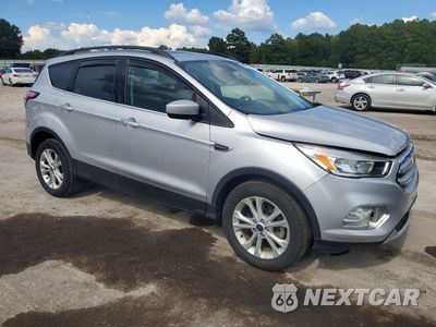 Czwarte zdjęcie samochodu z boku: 2018 FORD ESCAPE SE VIN:1FMCU0GD8JUB74916 - miniatura
