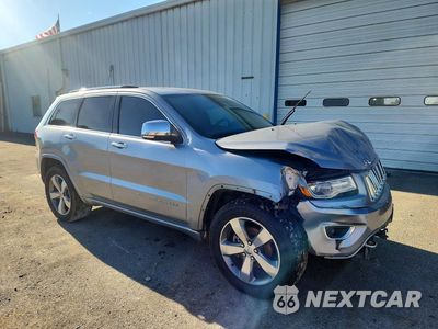 Czwarte zdjęcie samochodu z boku: 2015 JEEP GRAND CHEROKEE OVERLAND VIN:1C4RJECG1FC808360 - miniatura