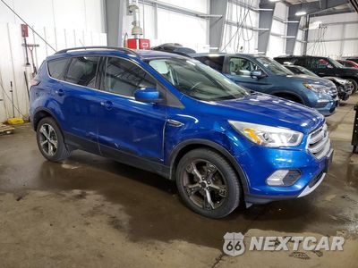 Czwarte zdjęcie samochodu z boku: 2017 FORD ESCAPE SE VIN:1FMCU9G9XHUA70714 - miniatura
