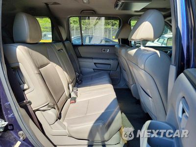 Zdjęcie 11 z 13 samochodu: 2013 HONDA PILOT EXL VIN:5FNYF4H59DB034227 - miniatura