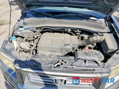 Zdjęcie 11 z 12 samochodu: 2008 HONDA RIDGELINE RT VIN:2HJYK16258H520161 - miniatura