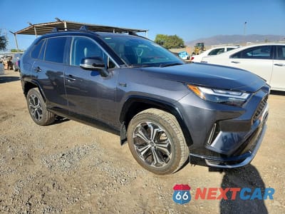 Czwarte zdjęcie samochodu z boku: 2022 TOYOTA RAV4 PRIME XSE VIN:JTMEB3FV3ND100811 - miniatura