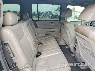 Zdjęcie 11 z 13 samochodu: 2011 HONDA PILOT TOURING VIN:5FNYF4H95BB036847 - miniatura