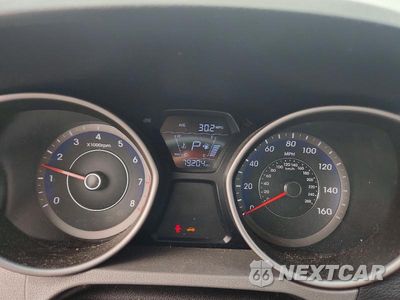 Zdjęcie 9 z 12 samochodu: 2014 HYUNDAI ELANTRA COUPE BASE VIN:KMHDH6AH1EU026698 - miniatura