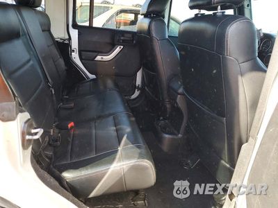 Zdjęcie 11 z 14 samochodu: 2012 JEEP WRANGLER UNLIMITED RUBICON VIN:1C4HJWFG5CL211172 - miniatura