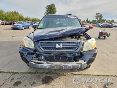 Piąte zdjęcie samochodu w środku: 2005 HONDA PILOT EX VIN:2HKYF18425H502310 - miniatura