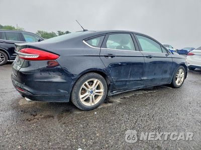 Trzecie zdjęcie samochodu z tyłu: 2018 FORD FUSION SE VIN:3FA6P0HD2JR283148 - miniatura