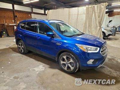 Czwarte zdjęcie samochodu z boku: 2017 FORD ESCAPE SE VIN:1FMCU9GD6HUB98033 - miniatura