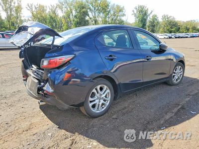 Trzecie zdjęcie samochodu z tyłu: 2016 SCION IA BASE VIN:3MYDLBZV9GY134607 - miniatura