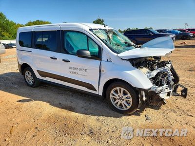 Czwarte zdjęcie samochodu z boku: 2023 FORD TRANSIT CONNECT XL VIN:NM0GS9E2XP1568720 - miniatura