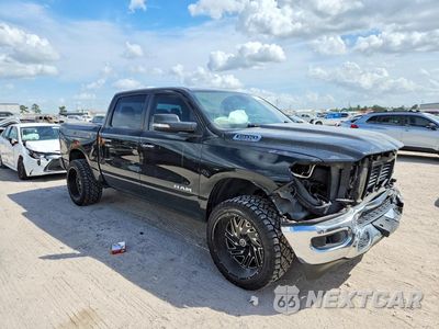 Czwarte zdjęcie samochodu z boku: 2020 RAM 1500 BIG HORN/LONE STAR VIN:1C6RREFT3LN156852 - miniatura