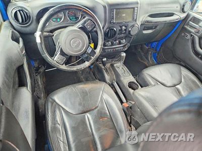 Zdjęcie 8 z 13 samochodu: 2015 JEEP WRANGLER UNLIMITED SAHARA VIN:1C4BJWEG9FL661399 - miniatura
