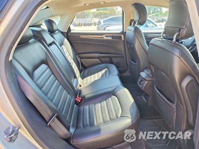 Zdjęcie 10 z 12 samochodu: 2013 FORD FUSION SE HYBRID VIN:3FA6P0LU8DR276880 - miniatura