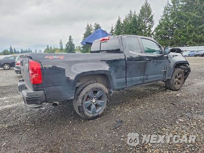 Trzecie zdjęcie samochodu z tyłu: 2016 CHEVROLET COLORADO LT VIN:1GCHTCE3XG1218952 - miniatura