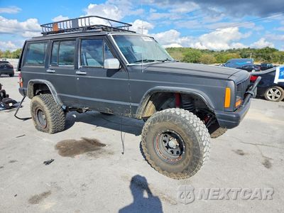 Czwarte zdjęcie samochodu z boku: 1992 JEEP CHEROKEE LAREDO VIN:1J4FJ58S2NL234411 - miniatura