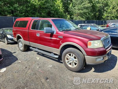 Czwarte zdjęcie samochodu z boku: 2004 FORD F150 VIN:1FTPX14504NC15182 - miniatura