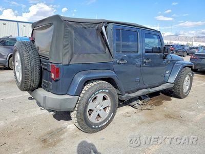 Trzecie zdjęcie samochodu z tyłu: 2007 JEEP WRANGLER SAHARA VIN:1J4GB59187L136381 - miniatura