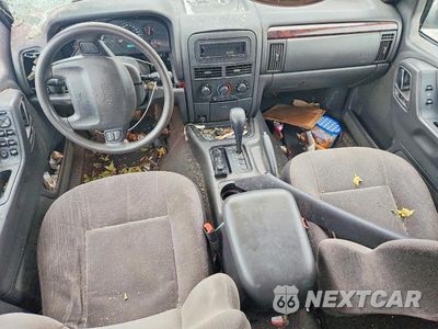 Zdjęcie 8 z 13 samochodu: 2000 JEEP GRAND CHEROKEE LAREDO VIN:1J4G248S3YC334937 - miniatura