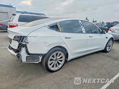 Trzecie zdjęcie samochodu z tyłu: 2022 TESLA MODEL 3 VIN:5YJ3E1EB8NF226892 - miniatura