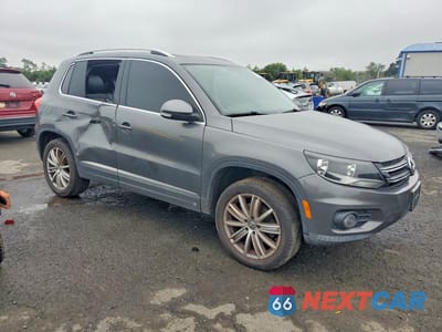Czwarte zdjęcie samochodu z boku: 2013 VOLKSWAGEN TIGUAN S VIN:WVGBV7AX5DW004249 - miniatura