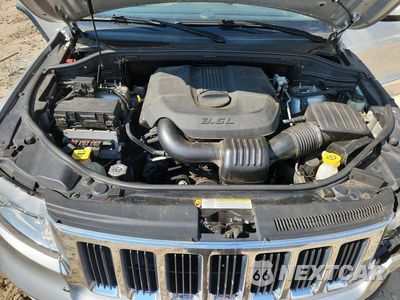 Zdjęcie 12 z 13 samochodu: 2011 JEEP GRAND CHEROKEE LAREDO VIN:1J4RR4GG9BC681214 - miniatura