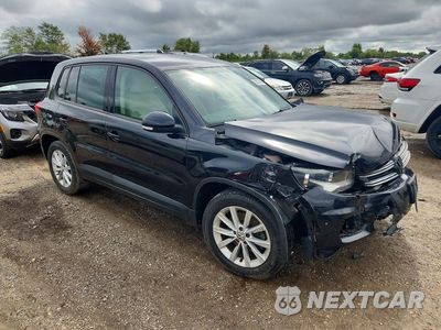 Czwarte zdjęcie samochodu z boku: 2014 VOLKSWAGEN TIGUAN S VIN:WVGAV3AX0EW544839 - miniatura