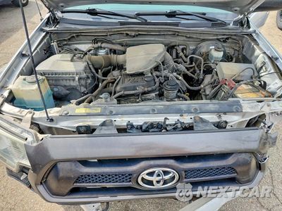 Zdjęcie 11 z 12 samochodu: 2012 TOYOTA TACOMA BASE VIN:5TFNX4CN4CX010431 - miniatura