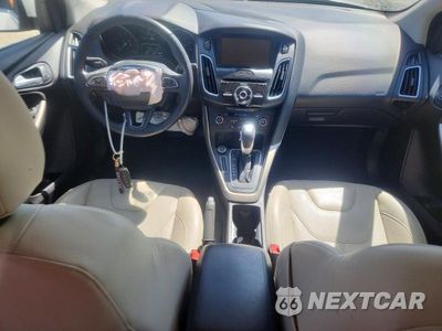 Zdjęcie 8 z 13 samochodu: 2015 FORD FOCUS TITANIUM VIN:1FADP3N26FL238182 - miniatura