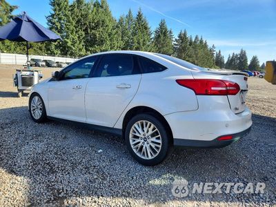 Drugie zdjęcie samochodu z przodu: 2017 FORD FOCUS TITANIUM VIN:1FADP3J24HL287857 - miniatura