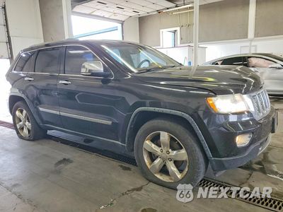 Czwarte zdjęcie samochodu z boku: 2012 JEEP GRAND CHEROKEE OVERLAND VIN:1C4RJFCT4CC214019 - miniatura