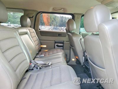 Zdjęcie 11 z 14 samochodu: 2003 HUMMER H2 VIN:5GRGN23U83H133071 - miniatura