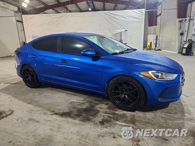 Czwarte zdjęcie samochodu z boku: 2017 HYUNDAI ELANTRA SE VIN:5NPD74LF7HH200571 - miniatura
